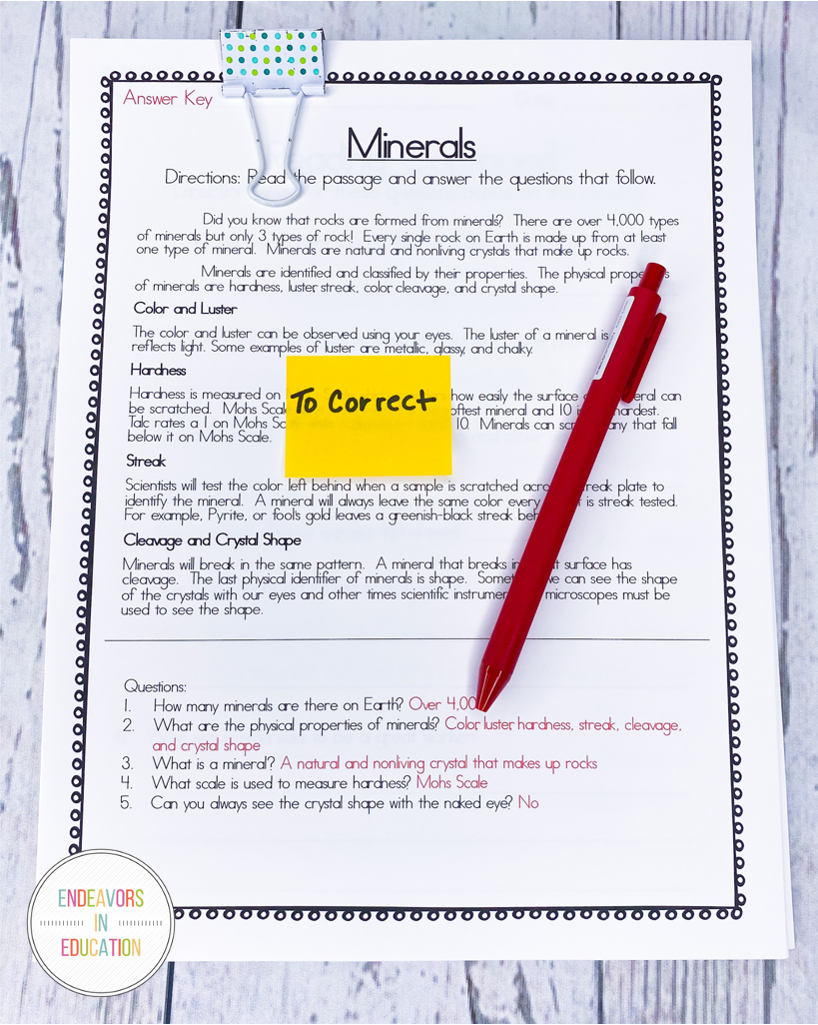 Stack of papers with to correct sticky note.  Red pen lays across papers.