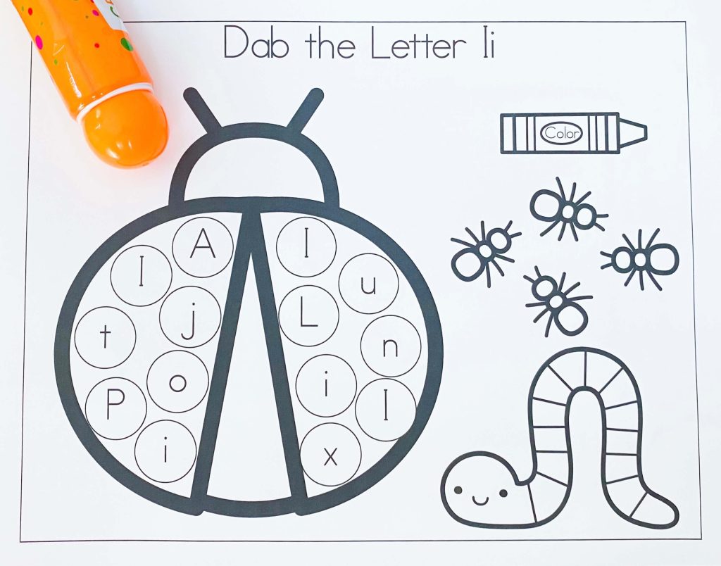 Letter I dot marker sheet has an image of a lady bug with letters inside the spots on its back.  There are I pictures next to the ladybug and an orange dot marker is on the paper.